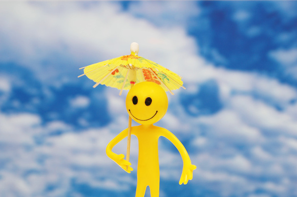 Smilie z żółtym parasolem - Zdjęcie, obraz