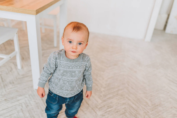 Cute little toddler boy looking straight into the camera - Fotografie, Obrázek