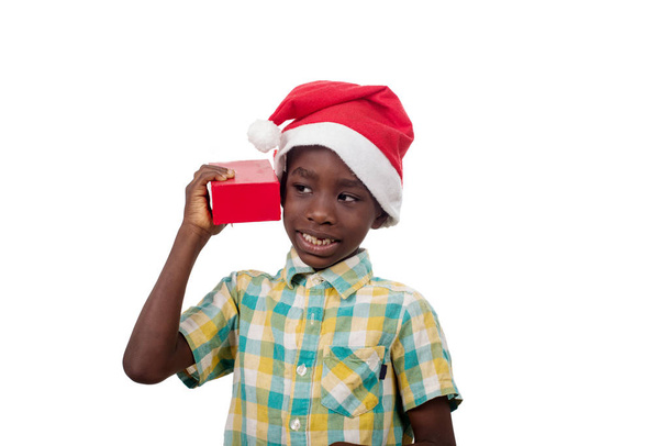 little boy with his Christmas present. - Фото, зображення