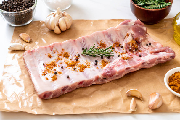 Fresh raw pork ribs ready for roasting  - Valokuva, kuva