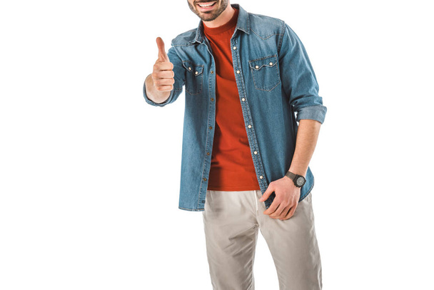 partial view of man in denim shirt showing thumb up isolated on white - Valokuva, kuva