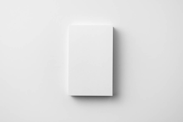 Top view of business card with copy space on white background  - Foto, imagen