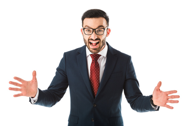 angry businessman in glasses quarreling and gesturing while looking at camera isolated on white - Фото, зображення