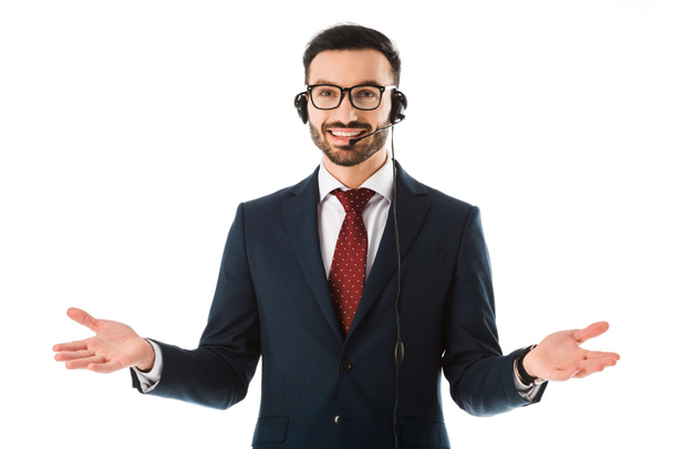 handsome call center operator in headset smiling and showing idea gesture isolated on white - Photo, Image