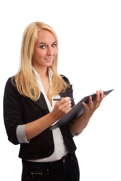 Young woman with checklist looking into camera - Foto, imagen