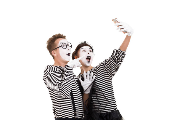Smiling mimes in striped shirts. - Photo, Image