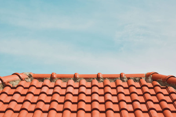 tile roof on the background of the bare sky. copy space for your text - Foto, imagen