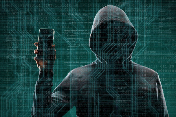 Computer hacker in mask and hoodie over abstract binary background. Obscured dark face. Data thief, internet fraud, darknet and cyber security concept. - Φωτογραφία, εικόνα