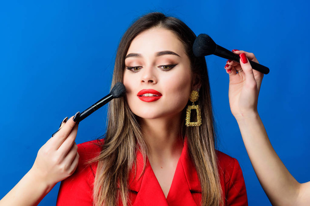 Fashion portrait of woman. beauty and fashion. hair beauty and hairdresser salon. jewelry earrings. Girl in red jacket. Sexy woman with professional makeup brush tool. Woman at shoe store - Foto, Bild