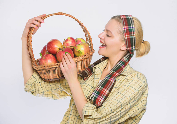 fall harvest. Autumn seasonal fruit. orchard, gardener girl with apple basket. vitamin and dieting food. farming concept. healthy teeth. Happy woman eating apple. Choose a healthy lifestyle - Foto, imagen