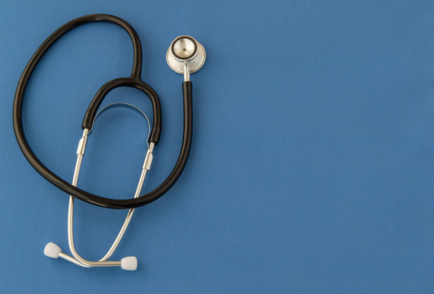 Stethoscope  on blue background. The concept of medicine. - Foto, Imagem