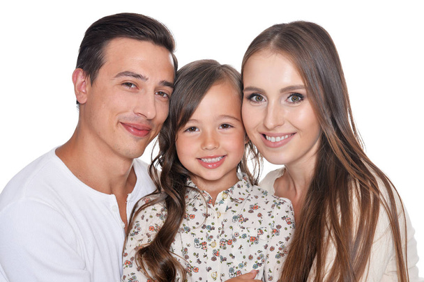 Счастливая семья из трех человек на белом
 - Фото, изображение