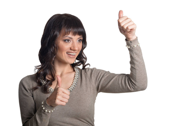 Woman shows thumbs up - Foto, imagen