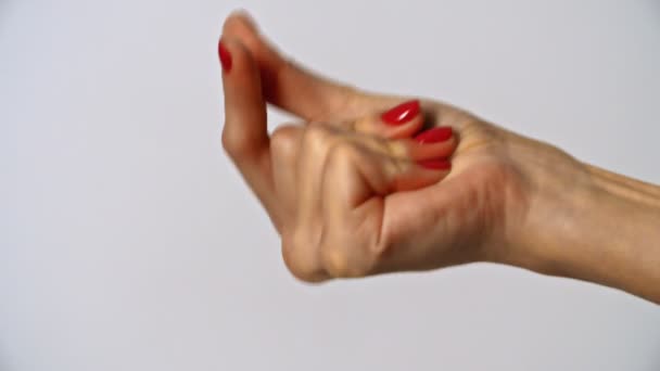 Womans Hand with snapping fingers - Materiaali, video