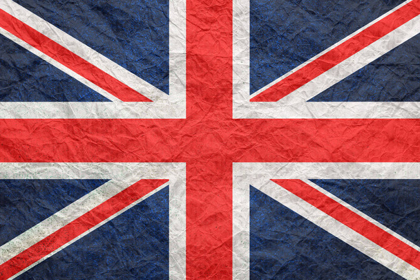 Βρετανική σημαία σε παλιό τσαλακωμένο χαρτί χειροτεχνίας.  - Φωτογραφία, εικόνα