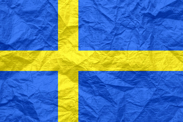 古いくしゃくしゃのクラフトペーパーのスウェーデンの旗.  - 写真・画像