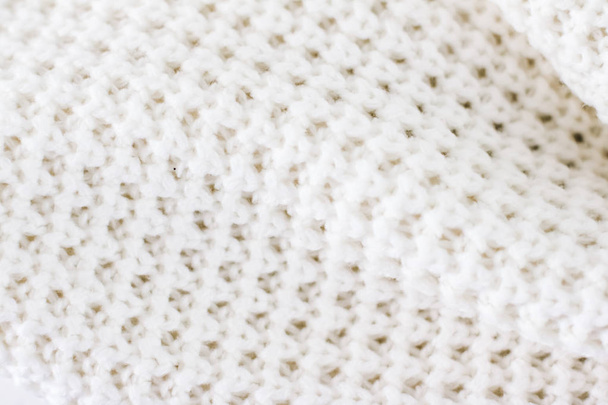 Warm knitted clothes, soft and white - Valokuva, kuva