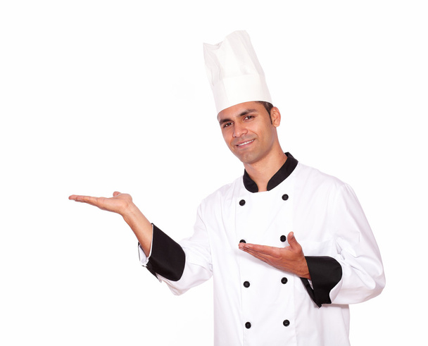 Male chef standing with palms open - Foto, imagen