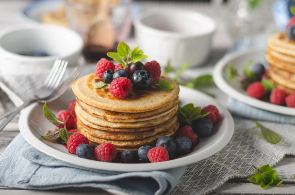 Pancakes with forest fruit sauce - 写真・画像