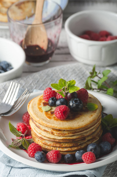 Pancakes with forest fruit sauce - Фото, зображення