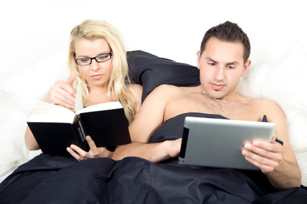 Married couple reading before sleeping - Photo, Image