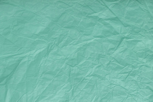 Textura de turquesa arrugada, papel de envolver, primer plano. Fondo viejo verde
 - Foto, Imagen