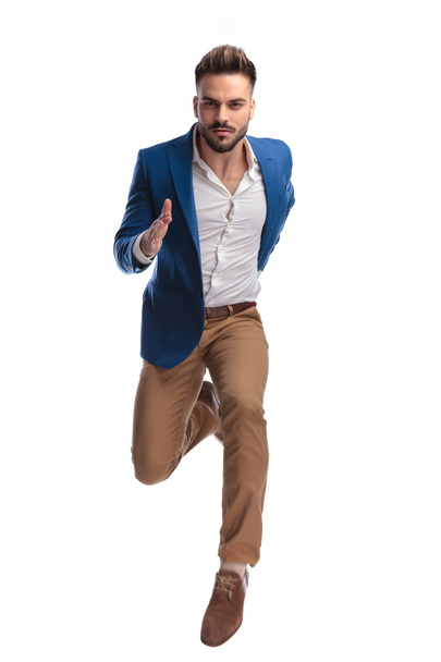 fashion man in suit sprinting fast - Fotó, kép