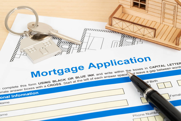 Formulário de pedido de hipoteca, conceito financeiro
 - Foto, Imagem