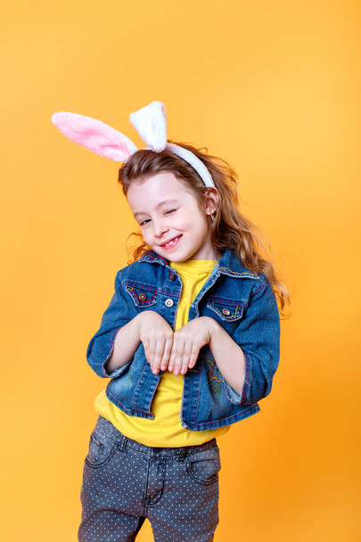 Being the best easter bunny. Cute little girl wearing bunny ears - Foto, immagini