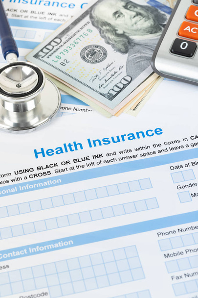 Health insurance application form with stethoscope and calculato - Φωτογραφία, εικόνα