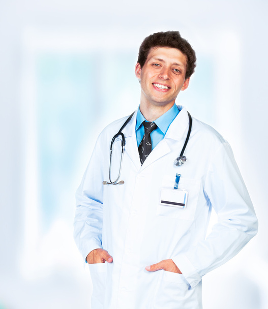 Portrait of the smiling doctor in interior - Photo, image