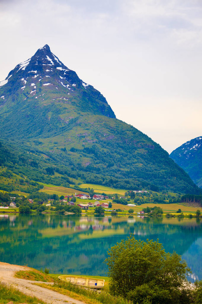 Reflection of mountains in norwegian fjord lake - Φωτογραφία, εικόνα