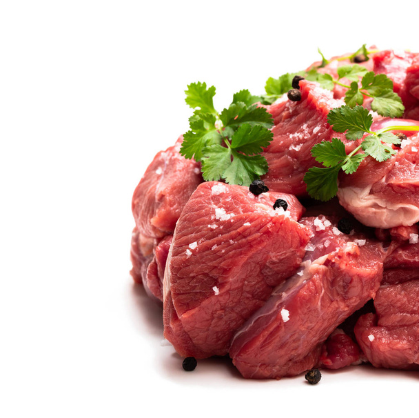 Zonder been lams steak vlees met specerijen geïsoleerd op wit  - Foto, afbeelding