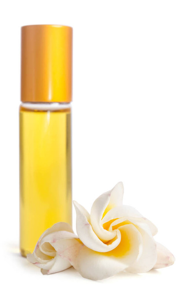  Beautiful flowers and bottle with  oils for skin - Foto, Imagen