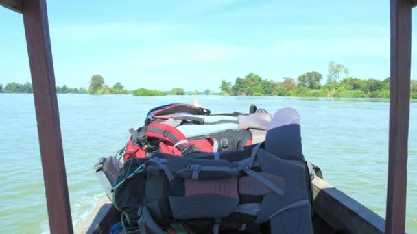 Navigating on the Mekong River 4001 islands Si Phan Don Laos famous tourist destination in South East Asia, clear blue sky, green tropical vegetation - Footage, Video