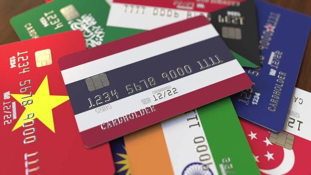 Muitos cartões de crédito com bandeiras diferentes, enfatizou cartão bancário com bandeira da Tailândia. Renderização 3D
 - Foto, Imagem