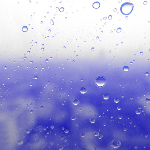 Water droplets texture on blue background - Photo, Image