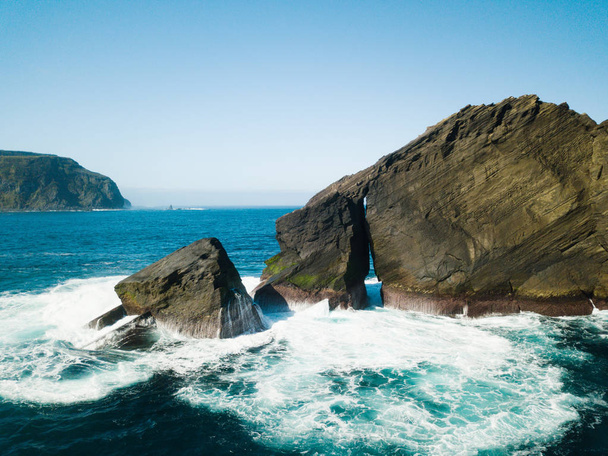 Birds eye view picture about wild rock formations in the middle of the open atlantic ocean next to Mosteiros, in Sao Miguel island, Azores, Portugal - Zdjęcie, obraz