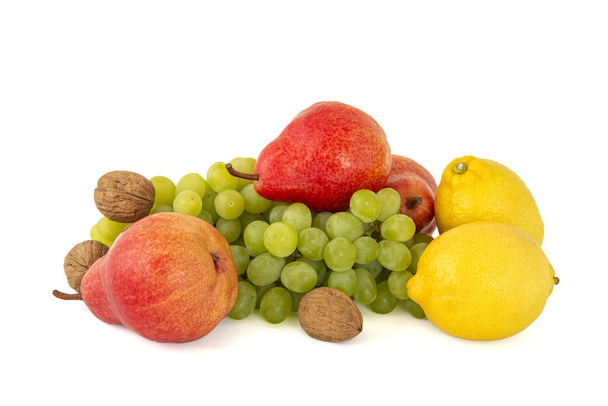 Bunch of ripe green grapes with ripe red pears Duchesse and waln - Photo, Image