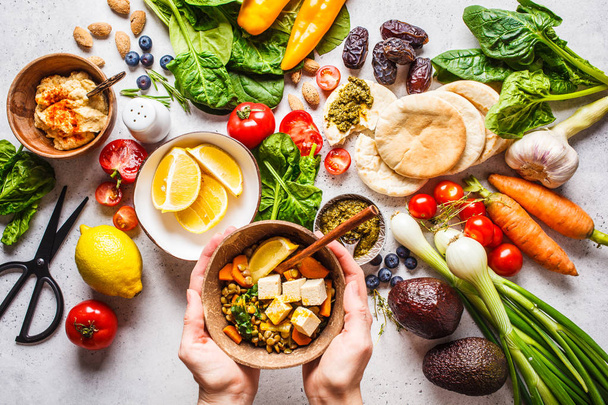 Healthy vegetarian food background. Vegetables, pesto and lentil - Foto, imagen