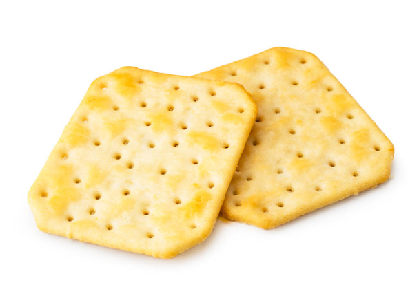 Deux biscuits crackers en gros plan sur un blanc. Isolé
. - Photo, image