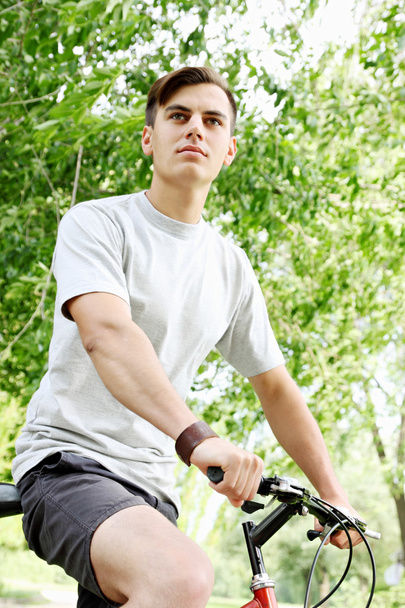 young guy on bicycle - Φωτογραφία, εικόνα
