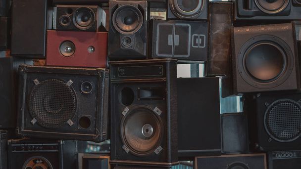 Creative music background made of vintage loudspeakers. Toned image. - Photo, Image