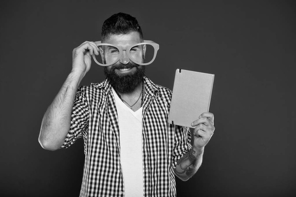 happy man with glasses and e-book. ready for reading. Hair and beard care. Mature hipster with beard. Bearded man. Male barber care. Confident and handsome Brutal man. new technology. e book reading - Фото, изображение