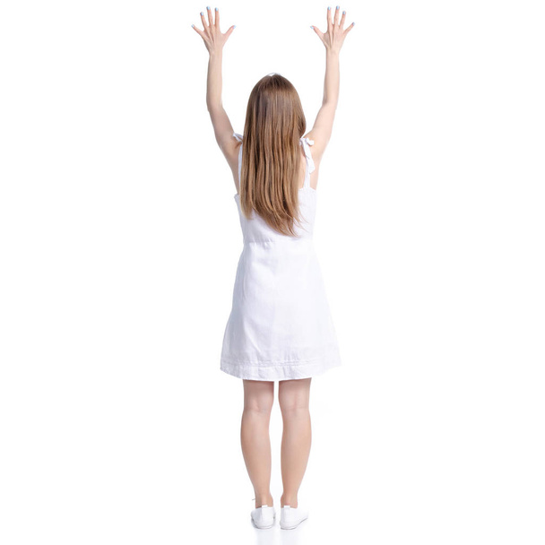 Woman in white dress standing hands up - Фото, зображення