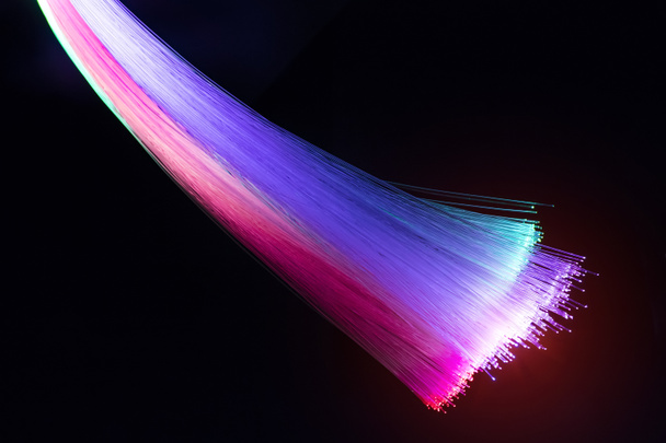 Fond abstrait de lumières de câble de réseau de fibre optique
 - Photo, image