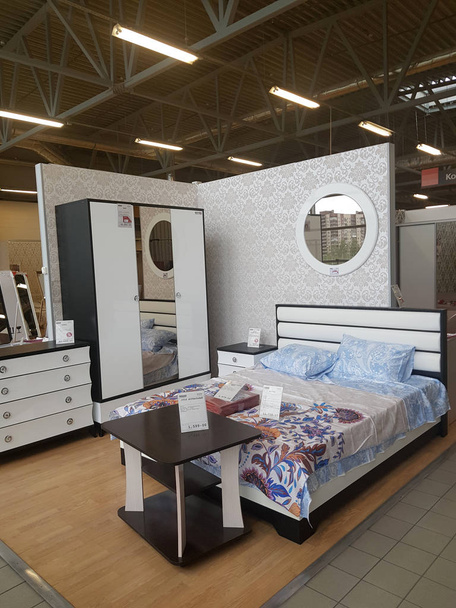 Bed and bedroom interior in a furniture store - Photo, image