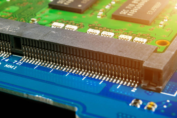 Macro shot of Circuit board with resistors microchips and electronic components. Computer hardware technology. Integrated communication processor. Information engineering. Semiconductor. PCB. Closeup - Foto, afbeelding