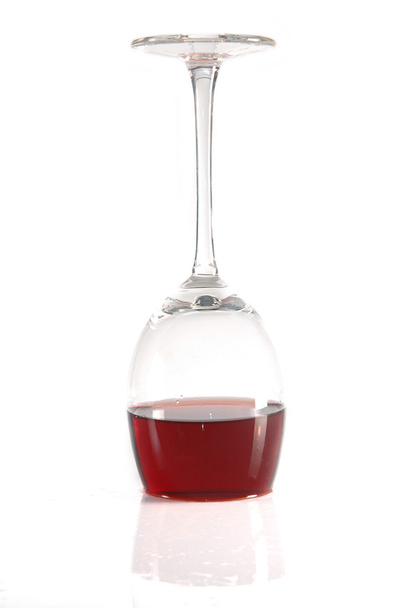Upside-down glass of wine - Фото, изображение