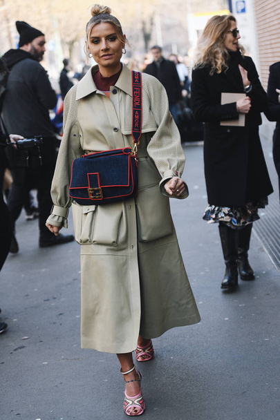 Milan, Italy - February 21, 2019: Street style Woman wearing a Fendi handbag before a fashion show during Milan Fashion Week - MFWFW19 - Fotoğraf, Görsel